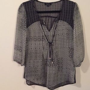 Women’s Shirt.  Size Small but fits more like Med.